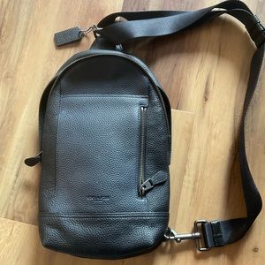 Coach black and blue sling